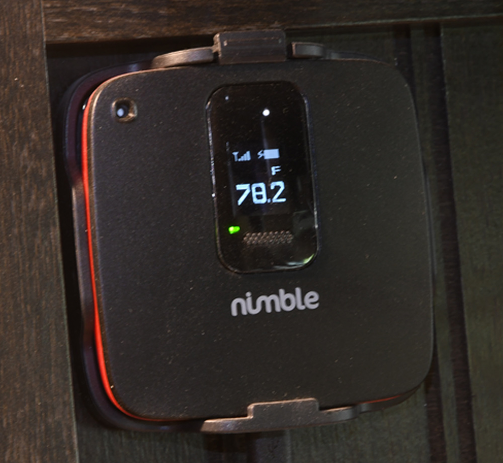close view of mounted Waggle pet monitor