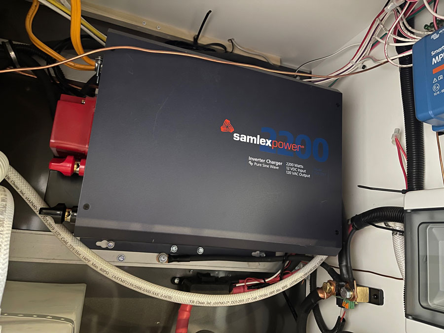The inverter/charger is a sizable unit, which required building a mounting frame from the wall stout enough to secure the unit.