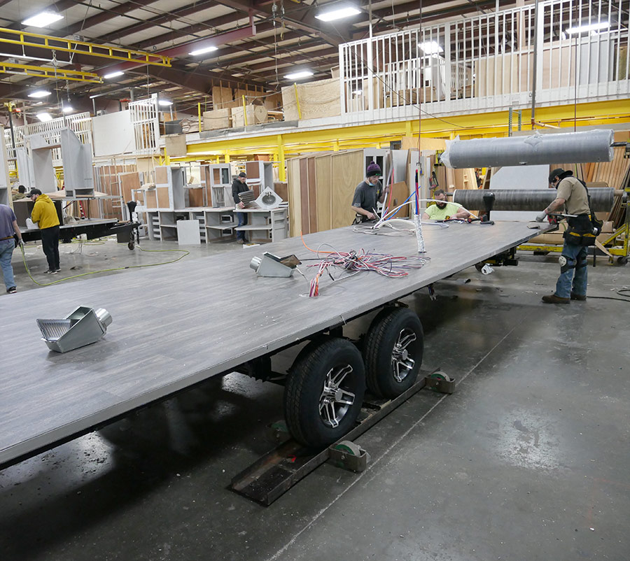 Keystone technicians preparing a floor to receive the rest of the house build