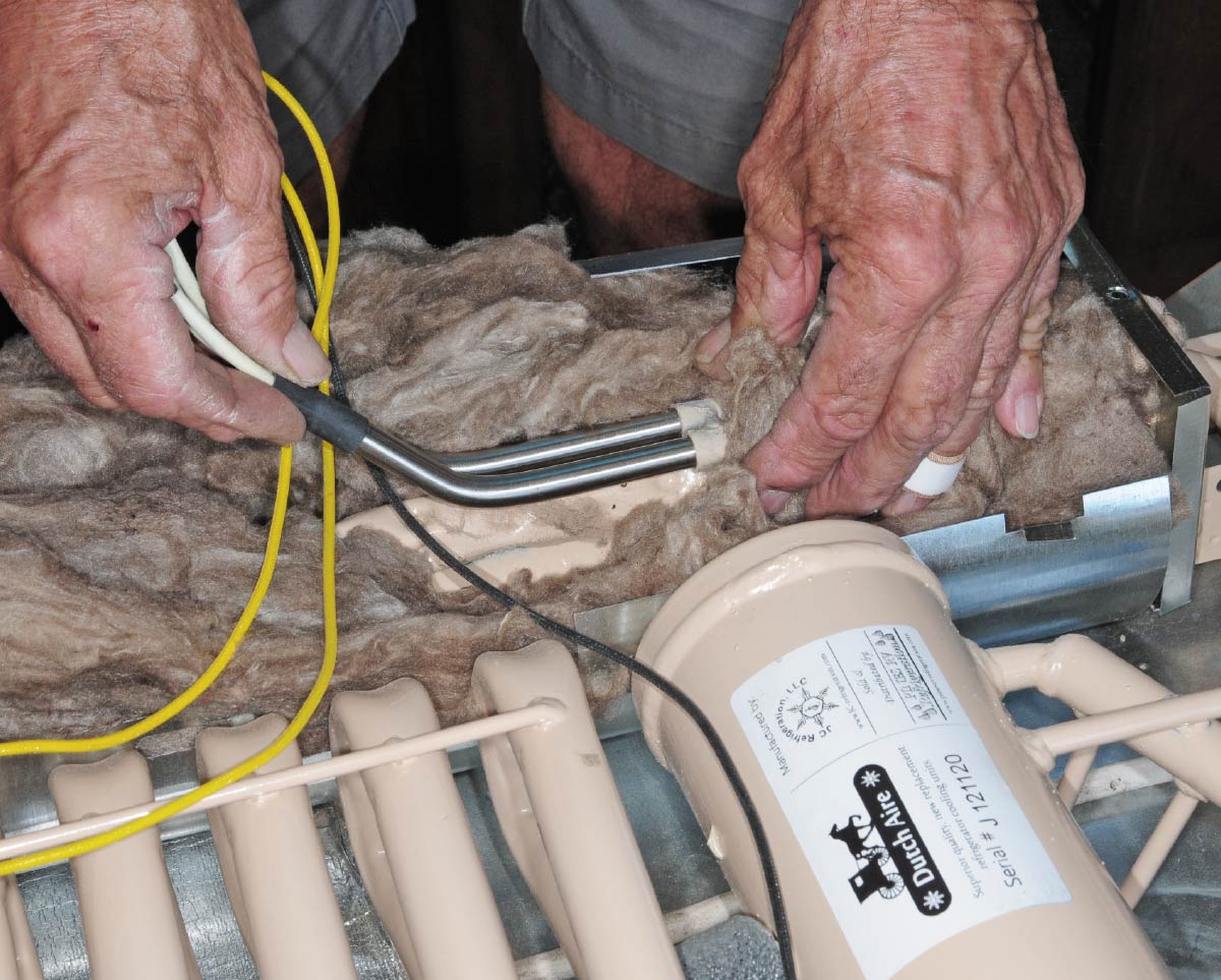 Place both new electric heating elements