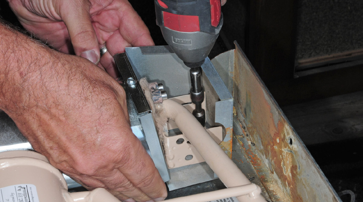 Screws into the burner box