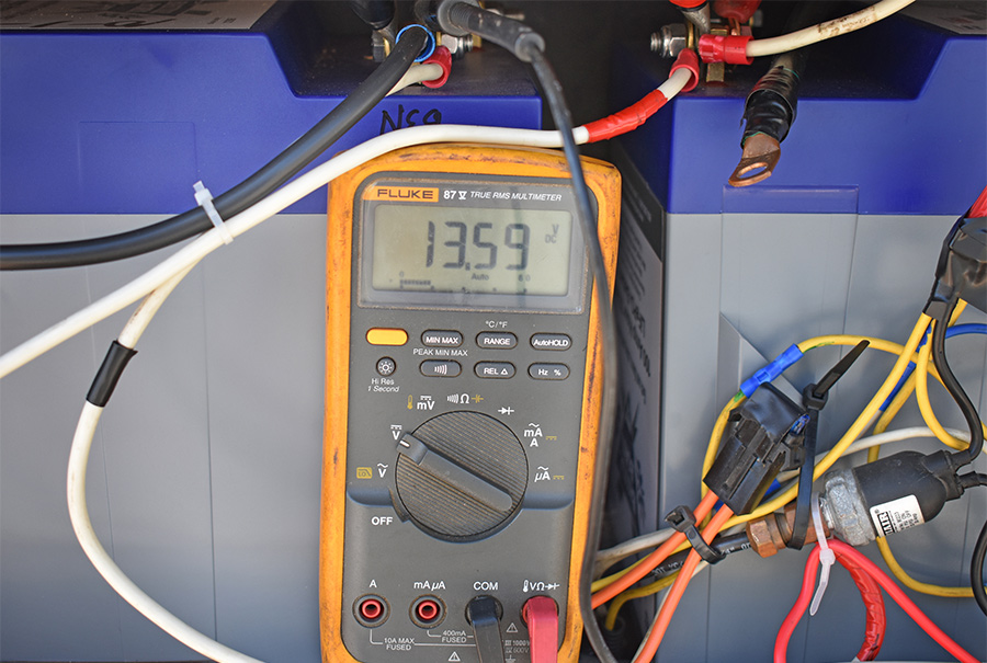 battery voltage being monitored using an accurate multimeter