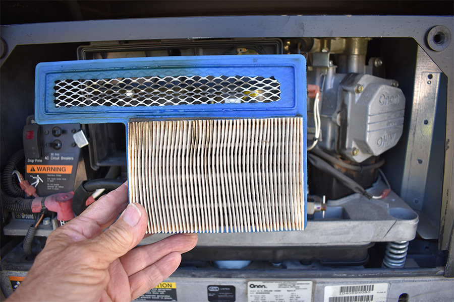 generator air filter being checked