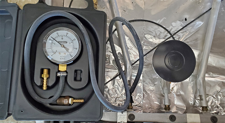 black and yellow dial manometer