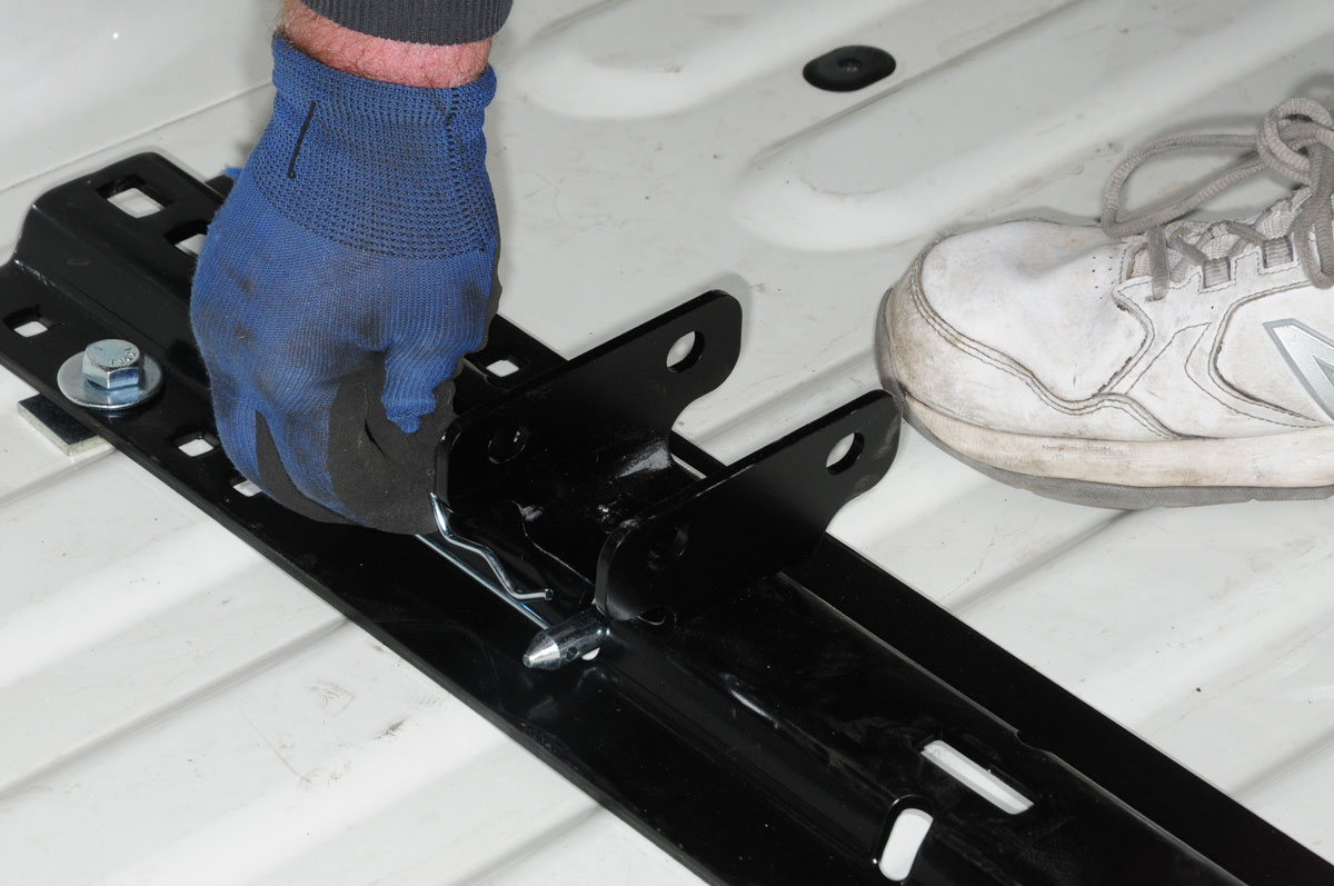 The base rail foot assemblies are pinned into the bed rails in their respective positions
