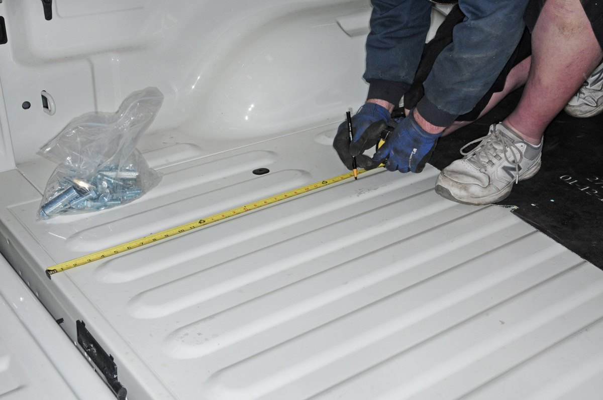 Before preparing and bolting the rail brackets to the frame, you’ll have to do some precise measuring. PullRite’s installation instructions show exactly where holes need to be drilled, which will take some study to make sure the measurements are correct.