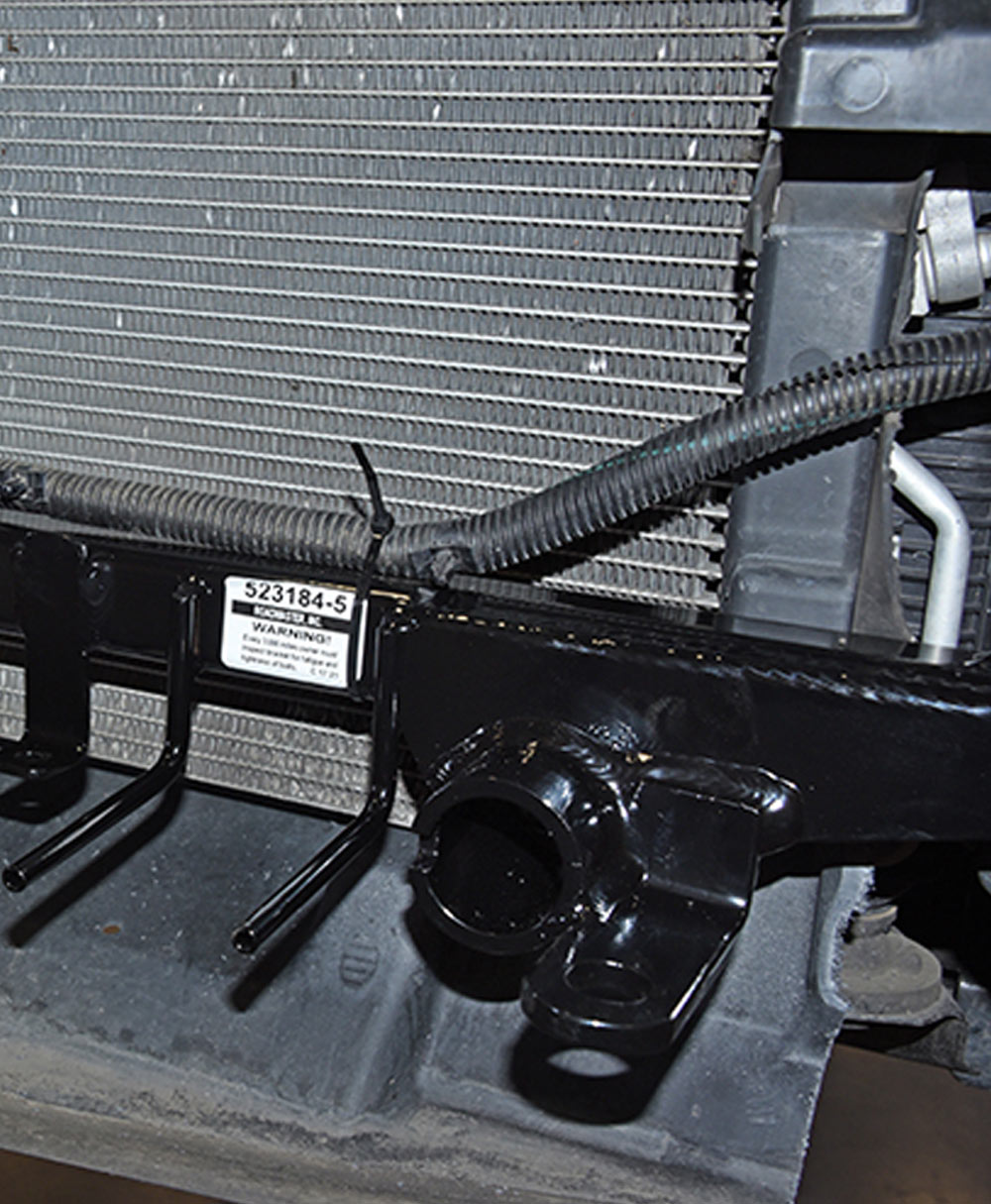 wiring harness secured to baseplate structure with nylon cables