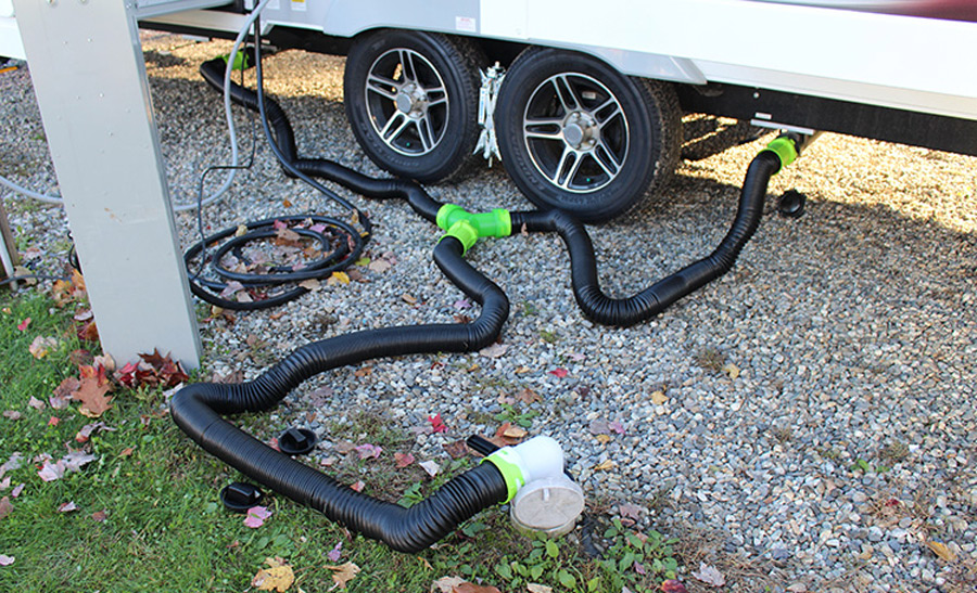 If your RV has two waste fittings like this one, consider using various lengths of hose and a wye fitting while you’re in camp