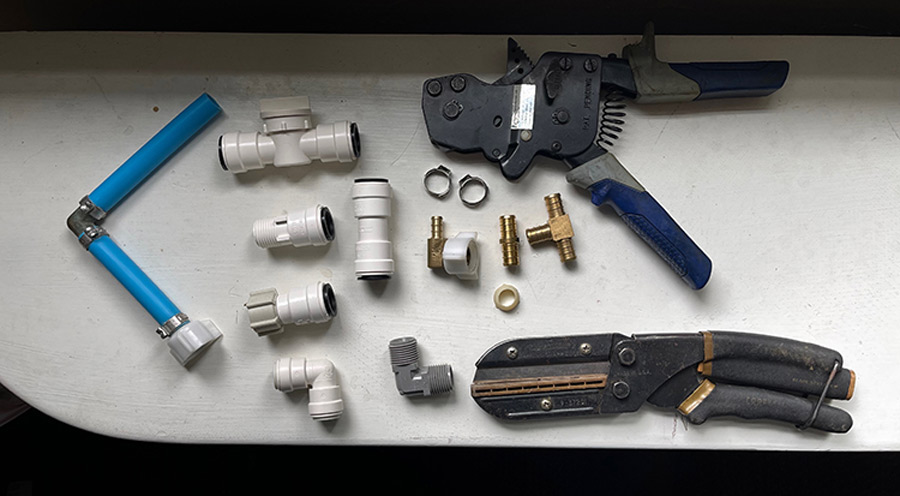 A PEX repair kit needs some sort of tube cutter plus a selection of fittings