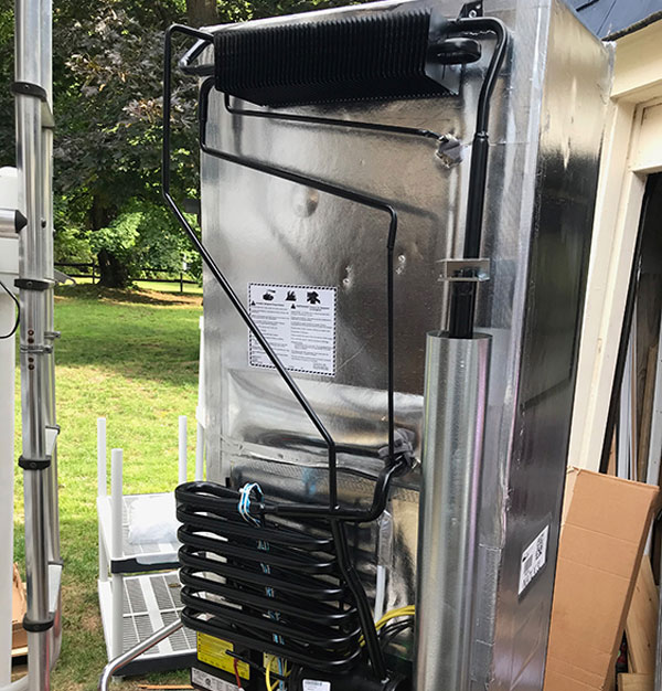 The Norcold Polar 7 looks a lot like other units, with the cooling unit and electronics on the rear