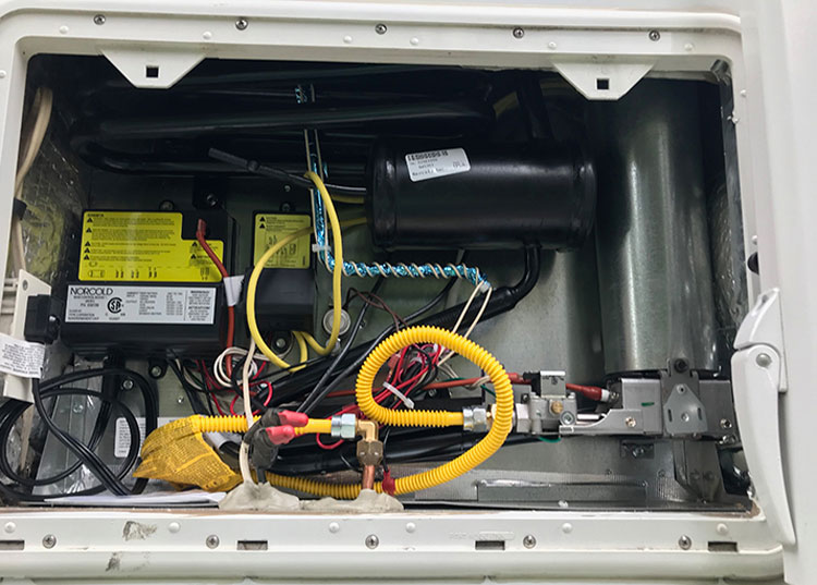 Once installed, the power and gas lines were connected. We also added a gas line extension here, and all connections were carefully tested for leaks