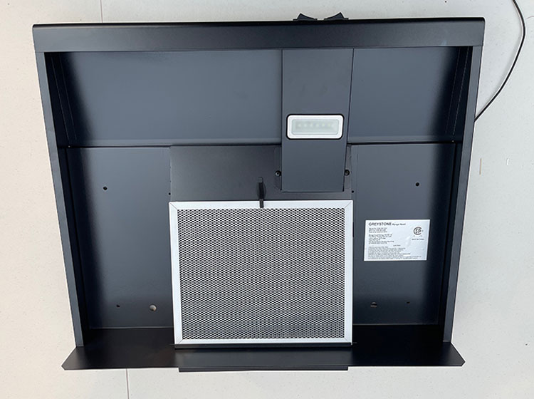 The new range hood is a solid, clean design with easily removable filter and LED light