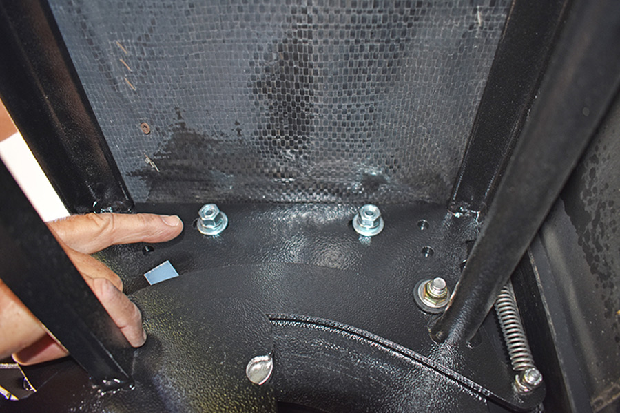 New bolts are installed through the Torklift frame and into the steel step-well panels