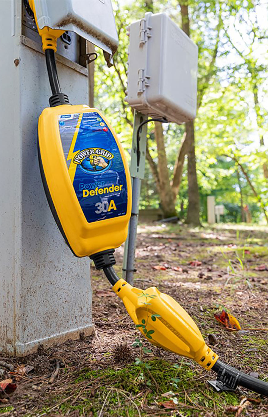 yellow Camco 30-Amp Power Grip connected