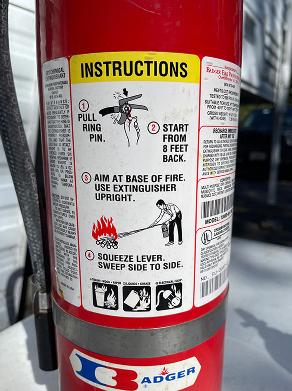 close view of the instructions label on a fire extinguisher