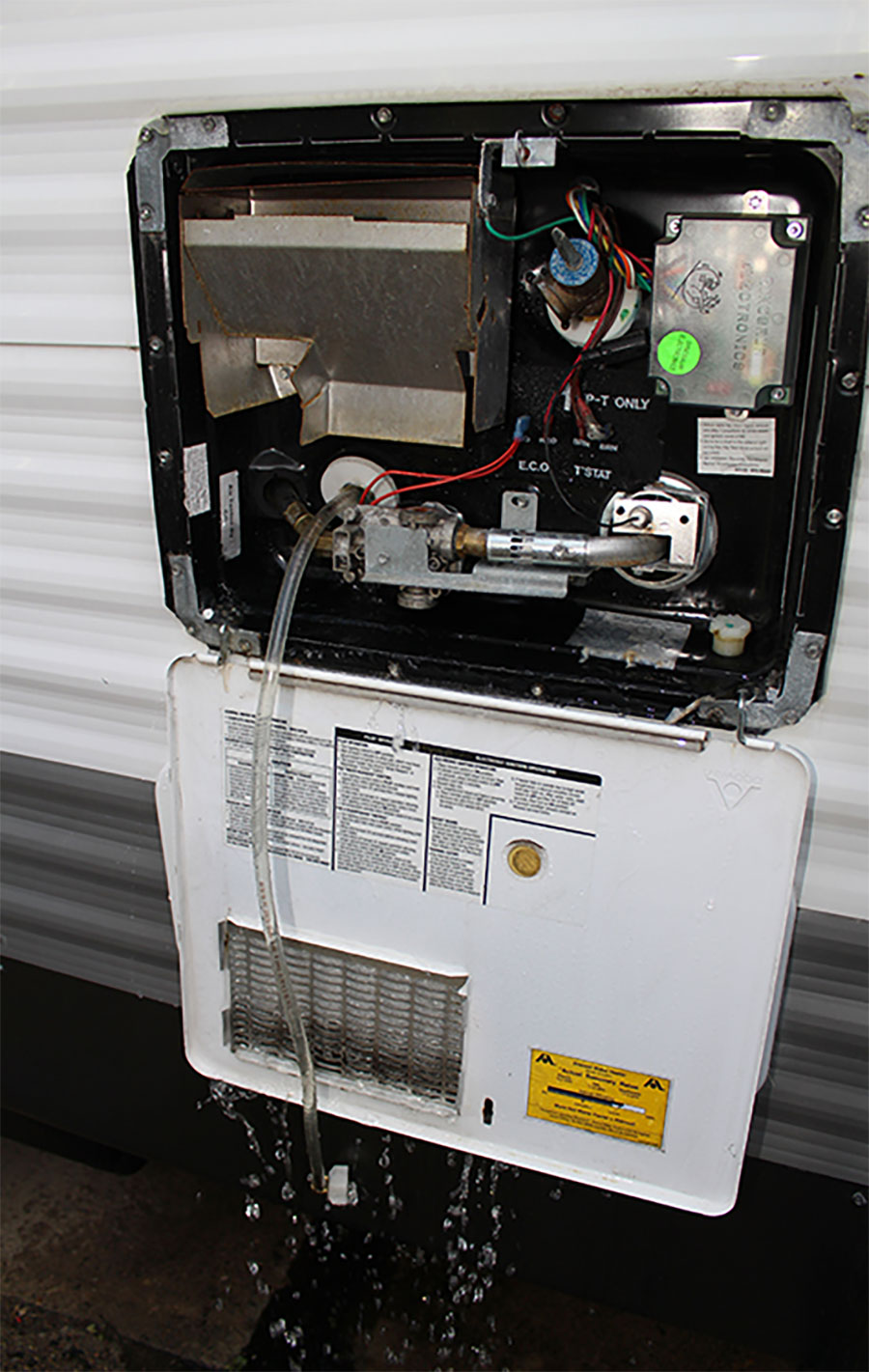 Removing the water heater’s drain plug
