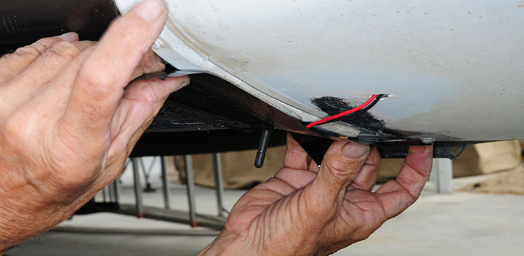 Mobile Home Flex Mend Belly Pan tape, designed for use on the polyethylene underbelly, is applied to the material and small area of fiberglass where holes were cut