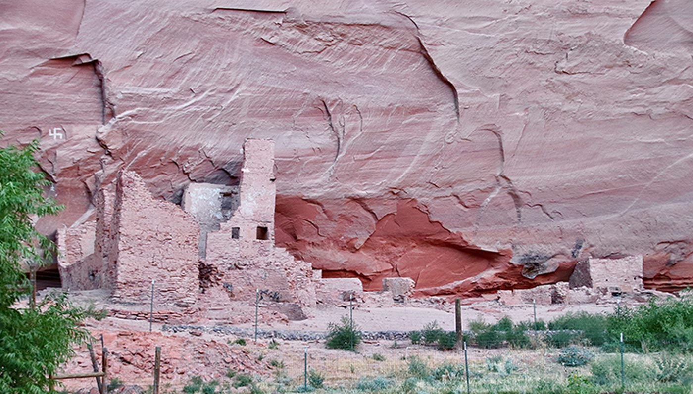 distant view of a masonry dwelling known as Mummy Cave