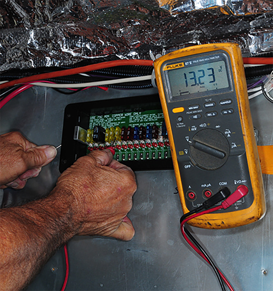 fuse panel being checked