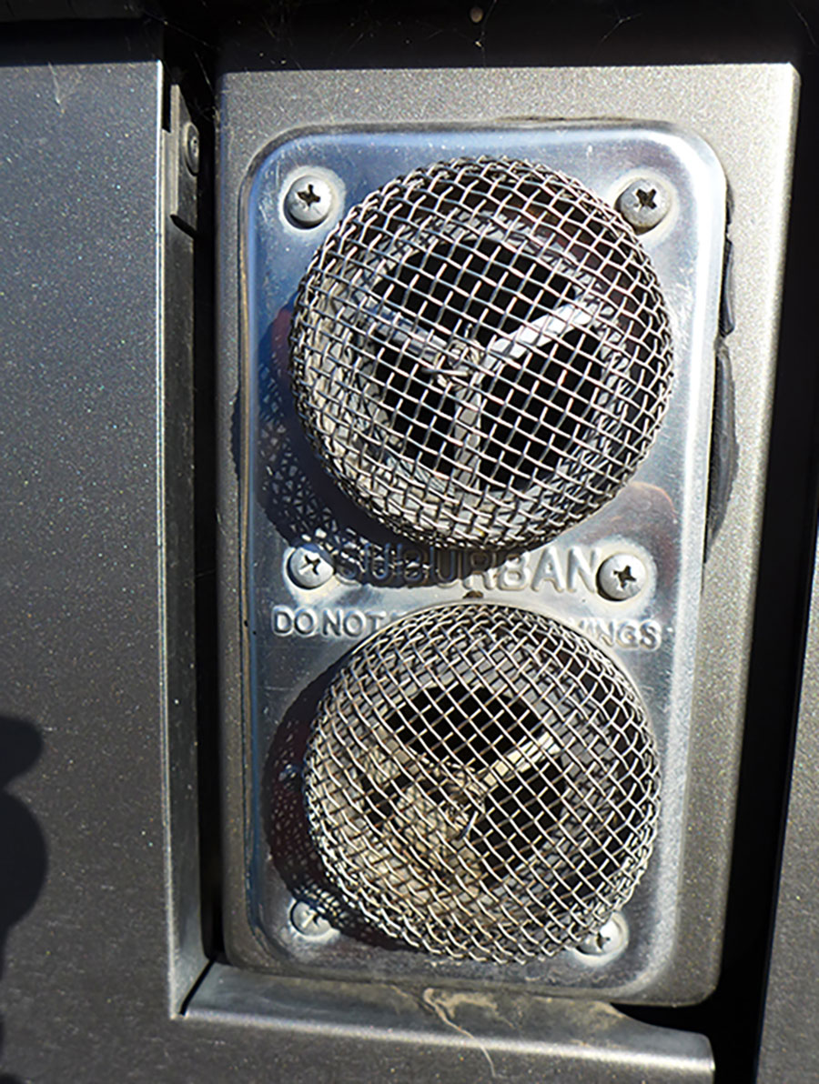 intake and exhaust ports with screen covers