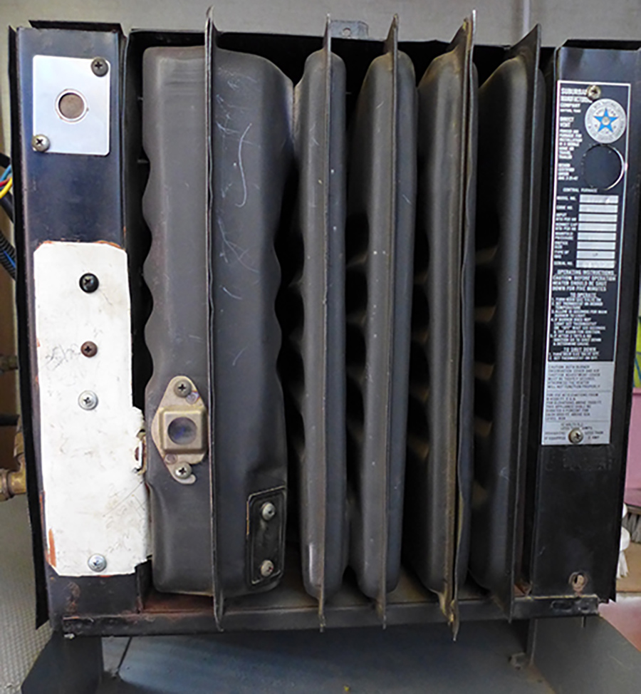 front cover removed from an older Suburban T-Series furnace