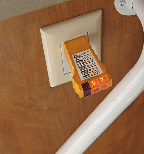 Finally, a circuit tester is used in a 120-volt AC outlet inside the motorhome to make sure the generator was installed properly and is working correctly