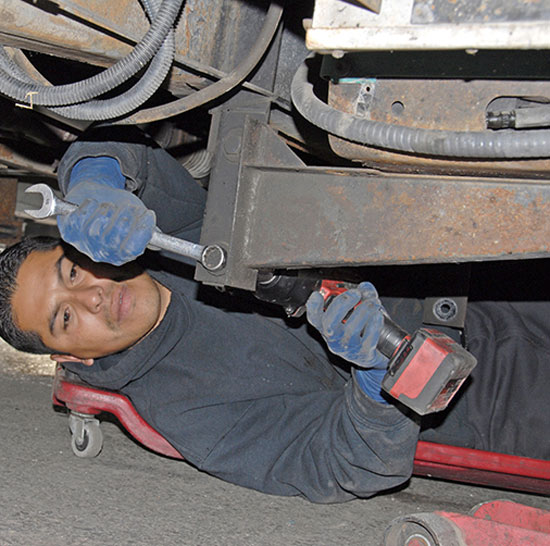 Next, the mounting brackets themselves are removed from the sub frame, and the generator can be lowered to the ground