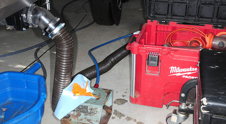 None of the equipment needed to flush the tanks is exotic, but care is taken to make sure no contents are spilled on the ground during the flushing process
