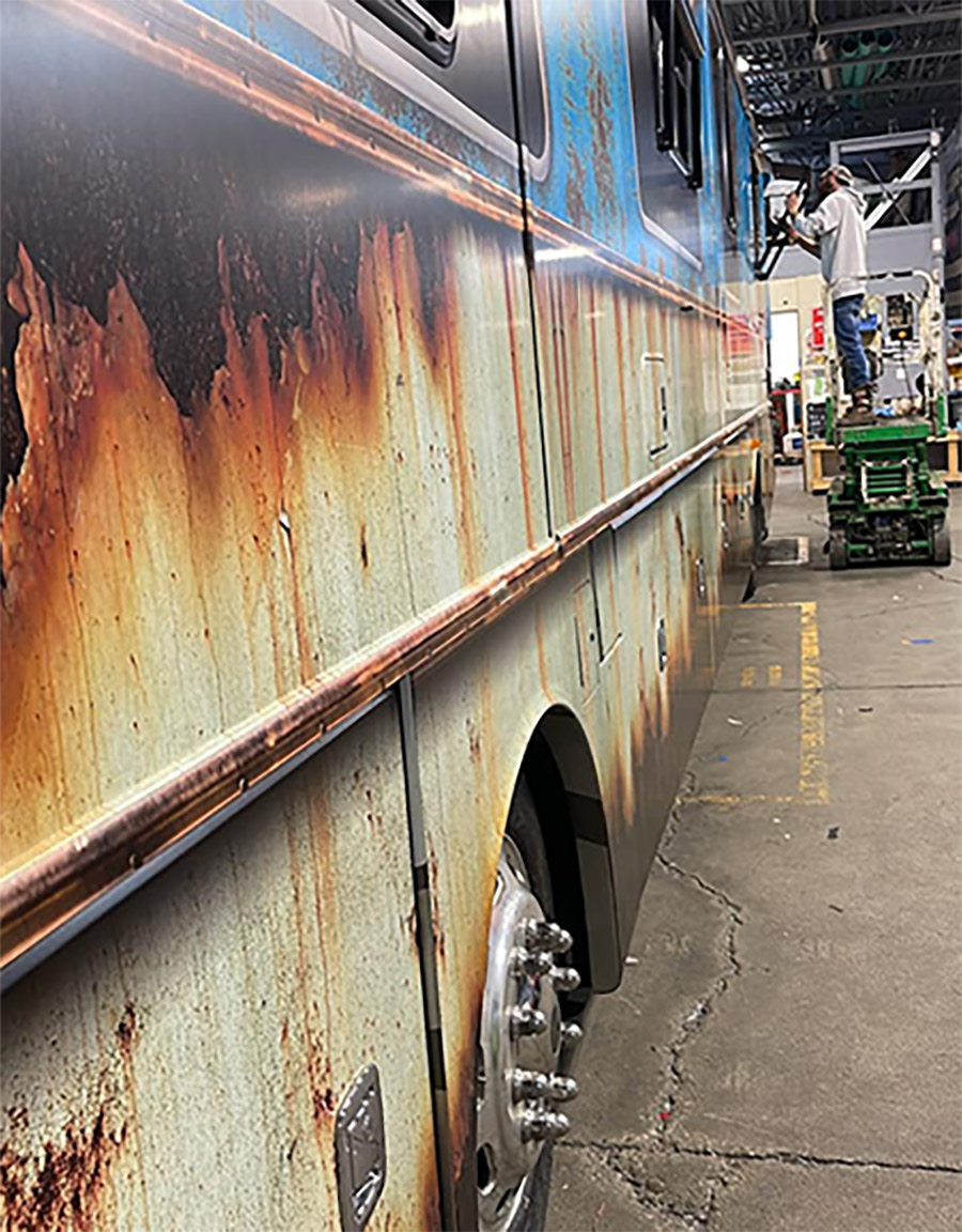 closeup of National Lampoon’s Christmas Vacation rust inspired graphics on bottom half of rv