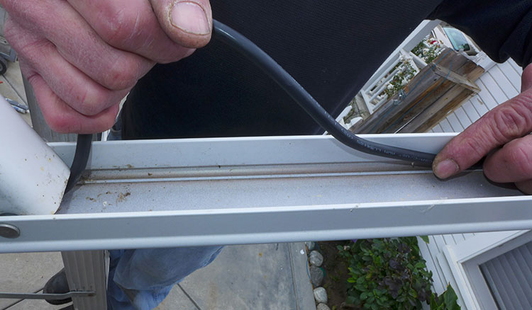 After the module was installed, the final 3-4 feet of cable were routed in the awning arm channel provided for this purpose