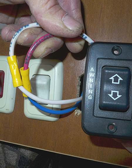 The wiring from the original extend/retract switch was disconnected to prevent accidental activation