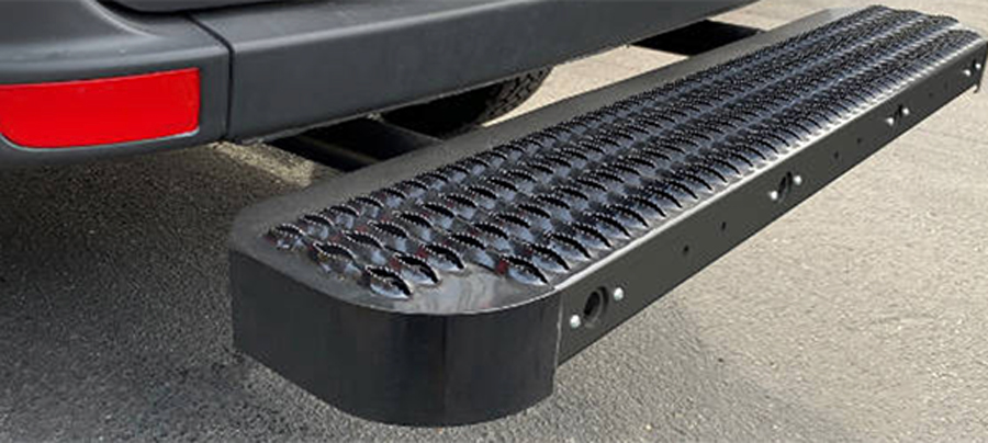 LUVERNE Impact shock-absorbing rear bumper step.