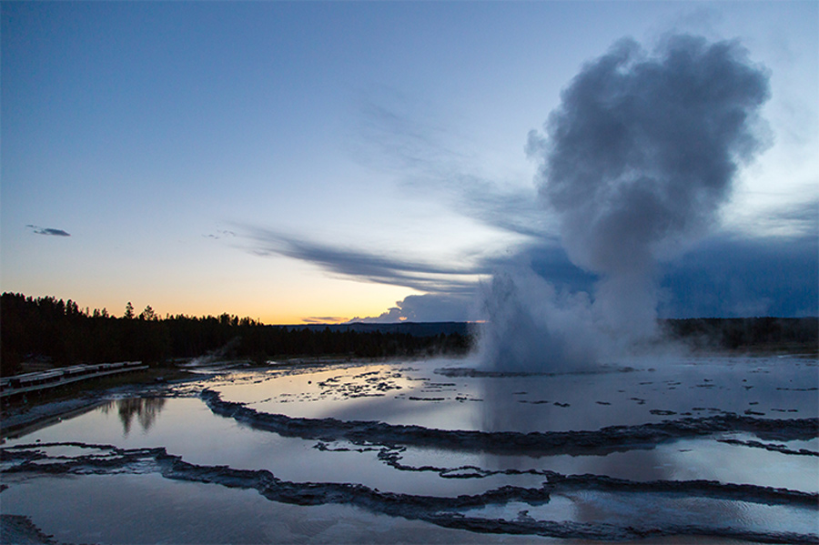 Sunset eruption of the Great Fountain Geyser, Yellowstone National Park. Photo courtesy NPS/Neal Herbert