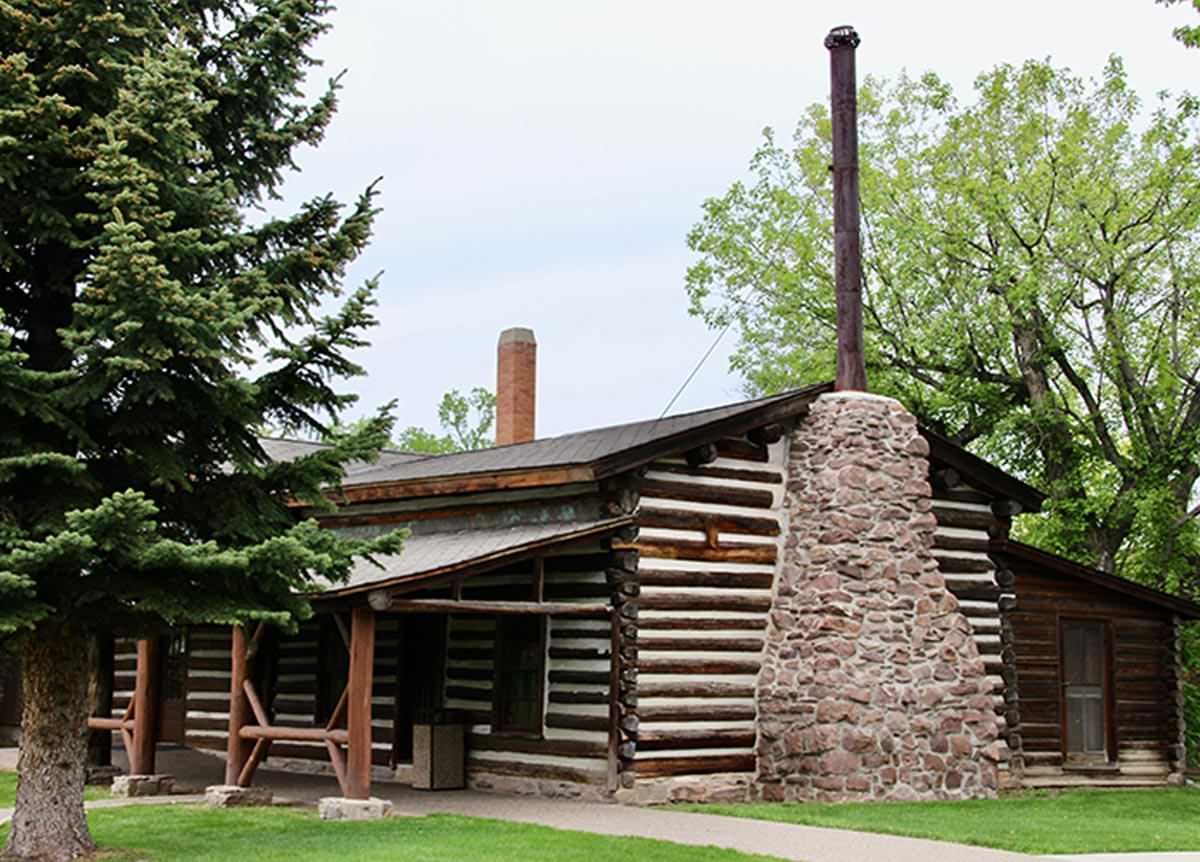 view of the original log cabin that served as Charles Russell’s studio, located at the art museum