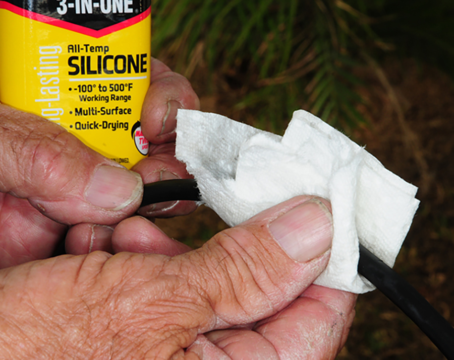 Silicone-based oil being rubbed on the wire jacket