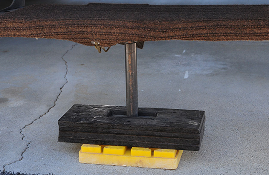 An RV step support with a common configuration of a pad for the ground and a threaded rod is attached to the bottom rung to provide better stability