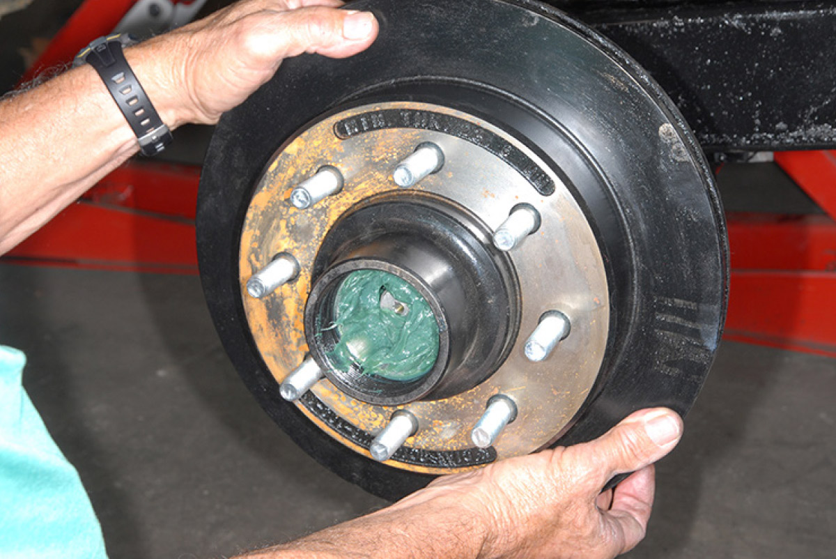 Rotors are positioned on the spindles. Here 13-inch rotors 