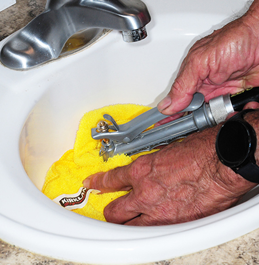 working in a sink in an RV
