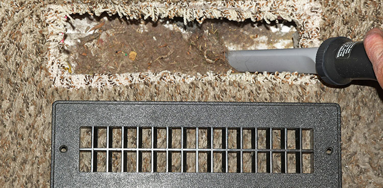 Registers in the floor have a tendency to collect dirt and lint below the grate