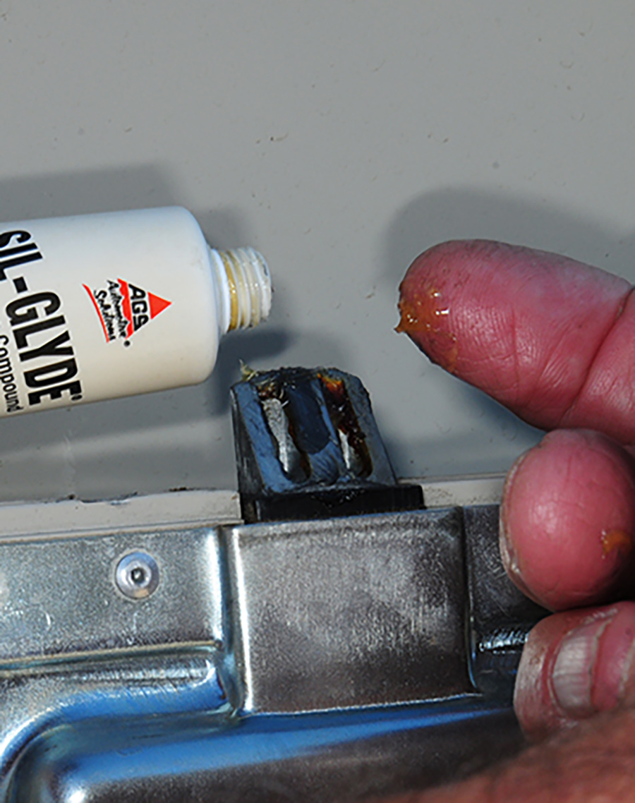a dab of Sil-Glyde to coating the surface of the bolt
