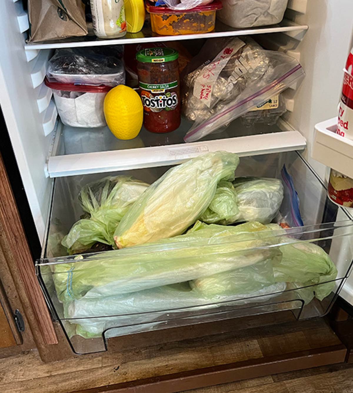 The crisper drawer holds a lot of veggies and has a humidity control