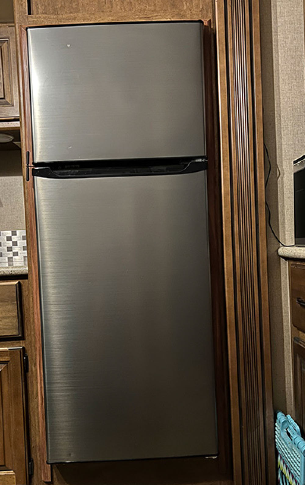 Stainless-steel doors are handsome and add a modern look to the interior of any RV