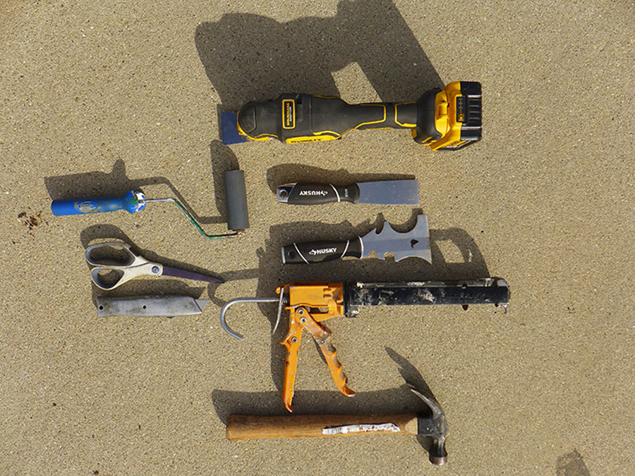 Tools required to scrape and seal a roof include masking tape, roller for the Eternabond, hammer and strong (sharp) putty knife; the cordless oscillating multi-tool with a scraping blade is optional but well worth the investment
