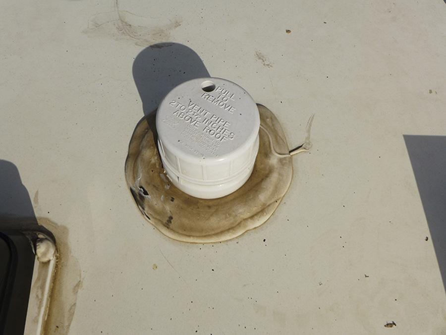 Although the original sealant was in poor condition, the plumbing vent was still viable in this case, but should be replaced if weather beaten