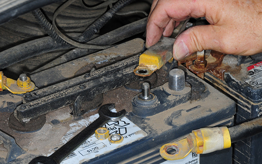 old temperature sensor being removed from one of the batterie