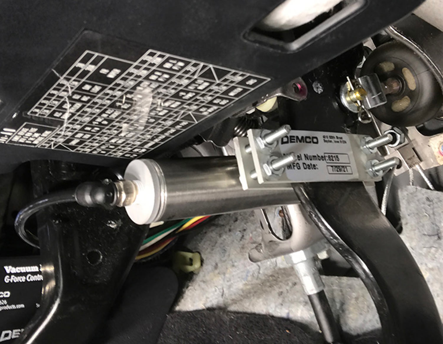 view under the dash at a little air cylinder