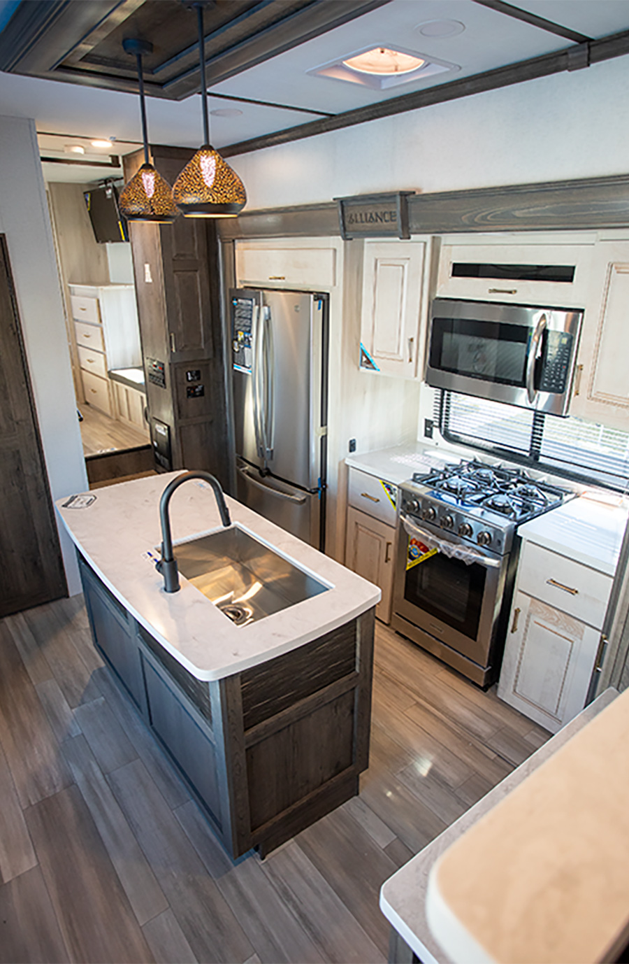 kitchen of the 2022 Paradigm 385FL fifth wheel by Alliance RV
