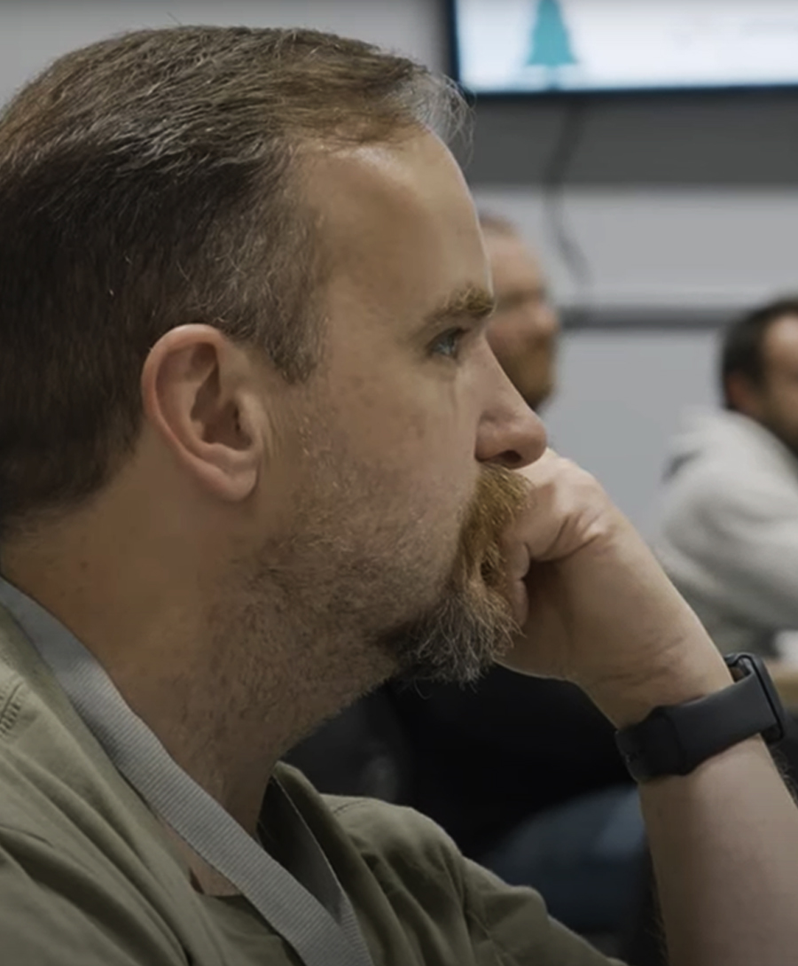 Participant listening as Lippert instructors outline tech procedures
