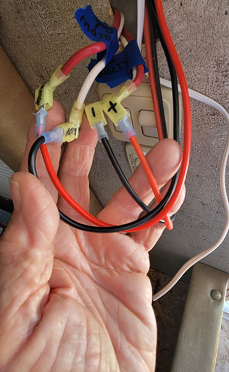 Wires were attached using speed terminals that fit in the existing spade connectors pulled off the existing extend/retract switch