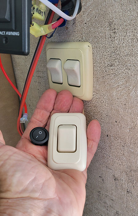 A small rocker switch for disabling the power to the awning is included in the kit